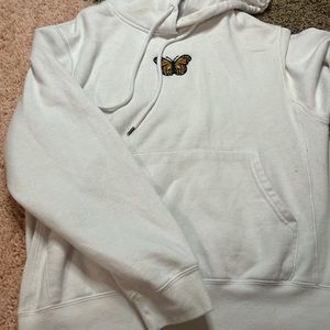 White hoodie with butterfly in the middle from rue21.
